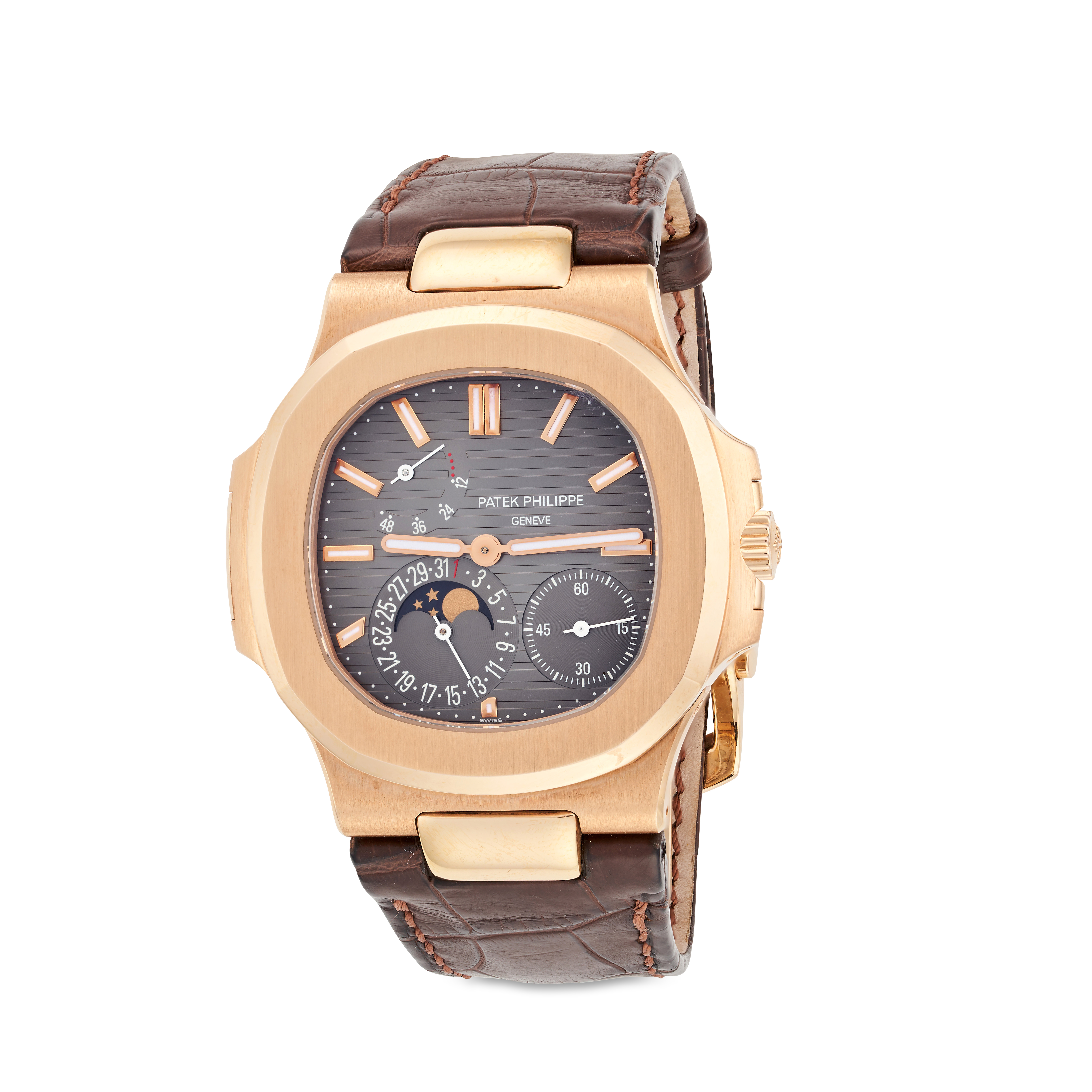 PATEK PHILIPPE - A NAUTILUS 18CT ROSE GOLD WRISTWATCH WITH POWER RESERVE, MOON PHASE, AND DATE, r...