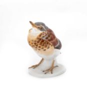 A MEISSEN MODEL OF A YOUNG BLACKBIRD, DESIGNED BY MAX BOCHMANN