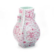 A CHINESE PUCE-DECORATED TURQUOISE GROUND VASE