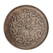 A CHINESE BRONZE MIRROR