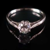 AN ART DECO PLATINUM DIAMOND SOLITAIRE RING