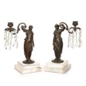 A PAIR OF 19TH CENTURY BRONZE FIGURAL CANDLESTICKS