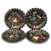 A SET OF FOUR VICTORIAN PAPIER-MÂCHÉ DISHES
