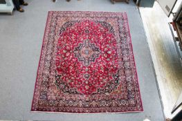 A PERSIAN KASHAN CARPET