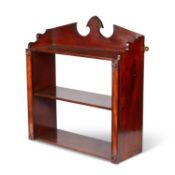 AN EARLY 19TH CENTURY MAHOGANY THREE-TIER WALL SHELF