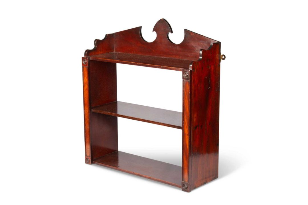 AN EARLY 19TH CENTURY MAHOGANY THREE-TIER WALL SHELF