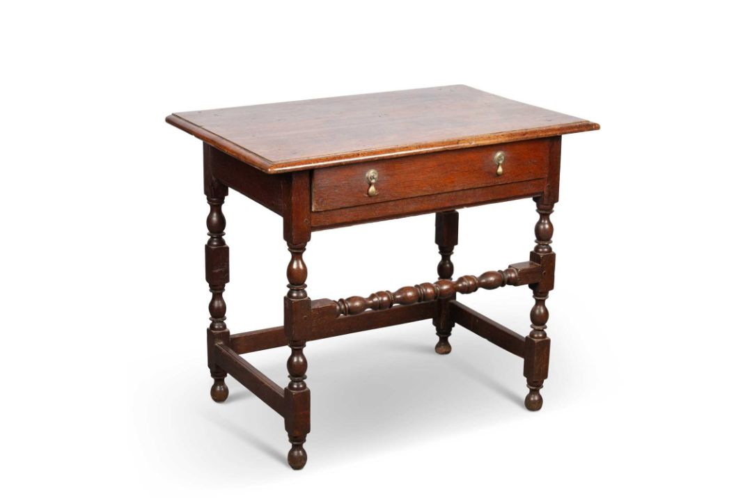 AN OAK SIDE TABLE, CIRCA 1700