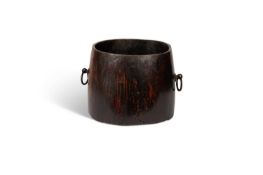 A TREEN CARVED-OUT TUB OR BUCKET