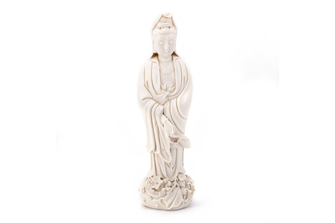 A CHINESE BLANC-DE-CHINE FIGURE OF GUANYIN