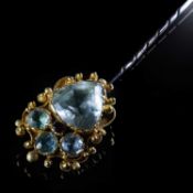 A 19TH CENTURY STYLE AQUAMARINE AND GARNET STICK PIN