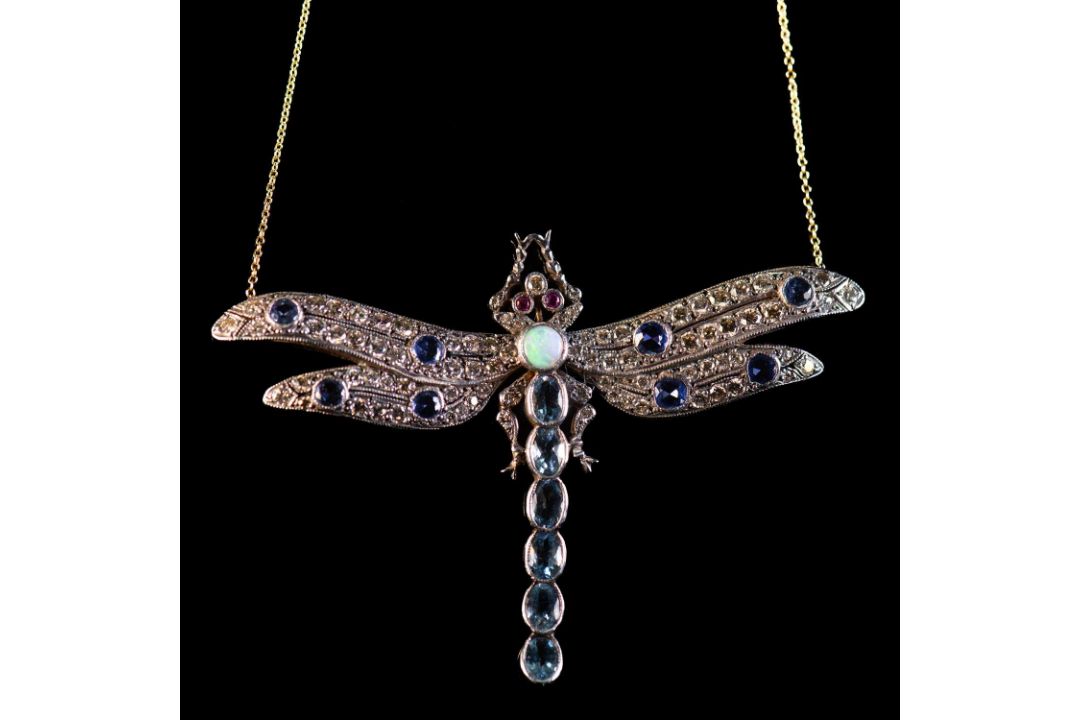 A 18 CARAT DIAMOND, SAPPHIRE, RUBY, AND OPAL SET DRAGONFLY NECKLACE