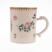 A CHINESE FAMILLE ROSE ARMORIAL MUG, QIANLONG