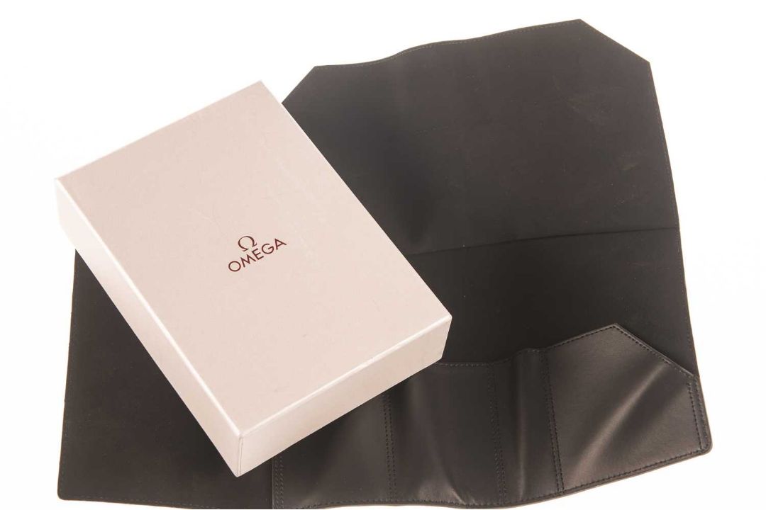 AN OMEGA WATCH STORAGE ROLL - Image 1 of 3