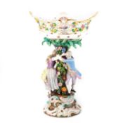 A LARGE MEISSEN FLOWER-ENCRUSTED FIGURAL CENTREPIECE, CIRCA 1870