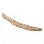 A WHALE BONE CARVING