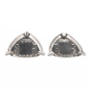 ARCHIBALD KNOX (1864-1933) FOR LIBERTY & CO, A PAIR OF TUDRIC PEWTER ASHTRAYS