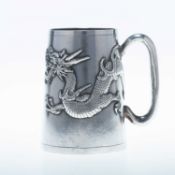 A CHINESE SILVER 'DRAGON' MUG