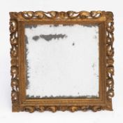 A 19TH CENTURY GILT-FRAMED MIRROR
