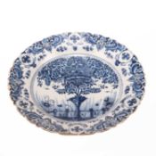 A DUTCH DELFT BLUE AND WHITE 'TEA TREE' CHARGER, 18TH CENTURY
