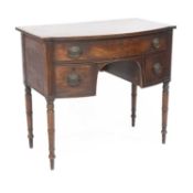 A REGENCY MAHOGANY BOW-FRONT DRESSING TABLE
