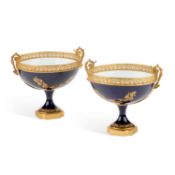 A PAIR OF CONTINENTAL GILT-METAL MOUNTED PORCELAIN COMPORTS, LATE 19TH/ EARLY 20TH CENTURY