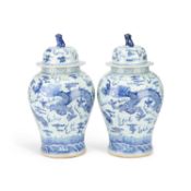 A LARGE PAIR OF CHINESE BLUE AND WHITE 'DRAGON' VASES AND COVERS