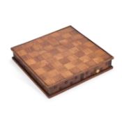 A 19TH CENTURY CARVED WOOD DOUBLE-SIDED GAMES BOARD