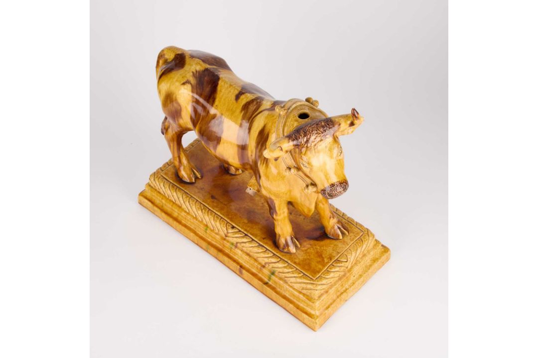 A LARGE PORTUGUESE POTTERY FLASK IN THE FORM OF A BULL, 19TH CENTURY - Image 2 of 4