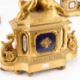 A 19TH CENTURY FRENCH GILT-METAL CLOCK GARNITURE - Image 5 of 9