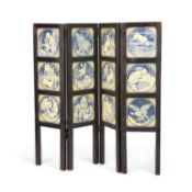 JOHN MOYR SMITH FOR MINTON, A SET OF TWELVE 'AESOP'S FABLES' TILES MOUNTED INTO A SCREEN