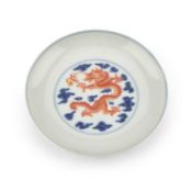 A CHINESE UNDERGLAZE BLUE AND IRON-RED 'DRAGON' DISH