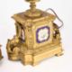 A 19TH CENTURY FRENCH GILT-METAL CLOCK GARNITURE - Image 4 of 9