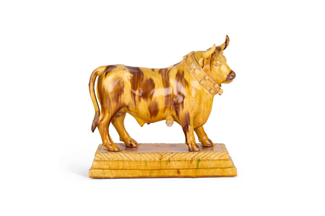 A LARGE PORTUGUESE POTTERY FLASK IN THE FORM OF A BULL, 19TH CENTURY - Image 1 of 4