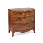 AN EARLY 19TH CENTURY MAHOGANY BOW-FRONT CHEST OF DRAWERS