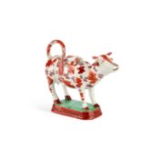 A STAFFORDSHIRE POTTERY COW CREAMER, CIRCA 1830-40