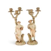 A PAIR OF ROYAL WORCESTER FIGURAL CANDELABRA