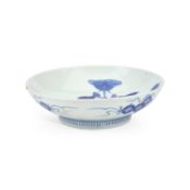 A JAPANESE BLUE AND WHITE PORCELAIN FOOTED DISH
