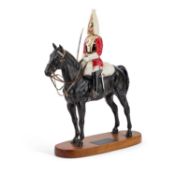 A BESWICK MODEL OF A 'LIFE GUARD'