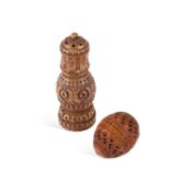 A 19TH CENTURY CARVED COQUILLA NUT POUNCE POT
