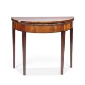 A GEORGE III MAHOGANY FOLDOVER DEMILUNE CARD TABLE