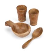 A 19TH CENTURY TREEN SPOON AND HANDLED BOWL