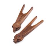 TWO PAIRS OF 19TH CENTURY CARVED NUTCRACKERS