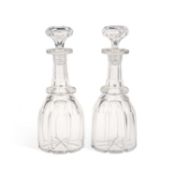 A PAIR OF 19TH CENTURY CUT-GLASS DECANTERS AND STOPPERS