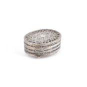 AN INDIAN PIERCED SILVER OVAL BOX