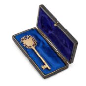 A GILT-METAL PRESENTATION KEY