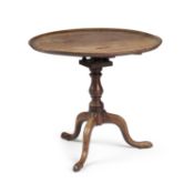 A GEORGE III MAHOGANY TILT-TOP TRIPOD TABLE