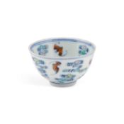 A CHINESE DOUCAI TEA BOWL