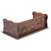 A POKERWORK BOOK TROUGH, CIRCA 1900