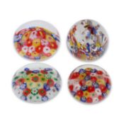 FOUR GLASS PAPERWEIGHTS