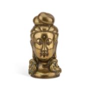 A BRONZE BUST OF GUANYIN